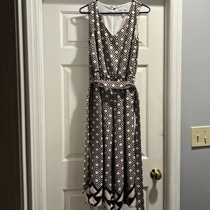 One piece sleeveless tri colored jumper zipper in back